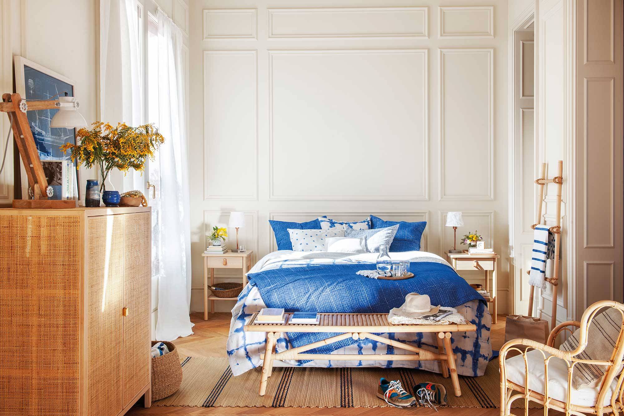 Bedroom in a regal estate with blue moldings and bedding 00501536