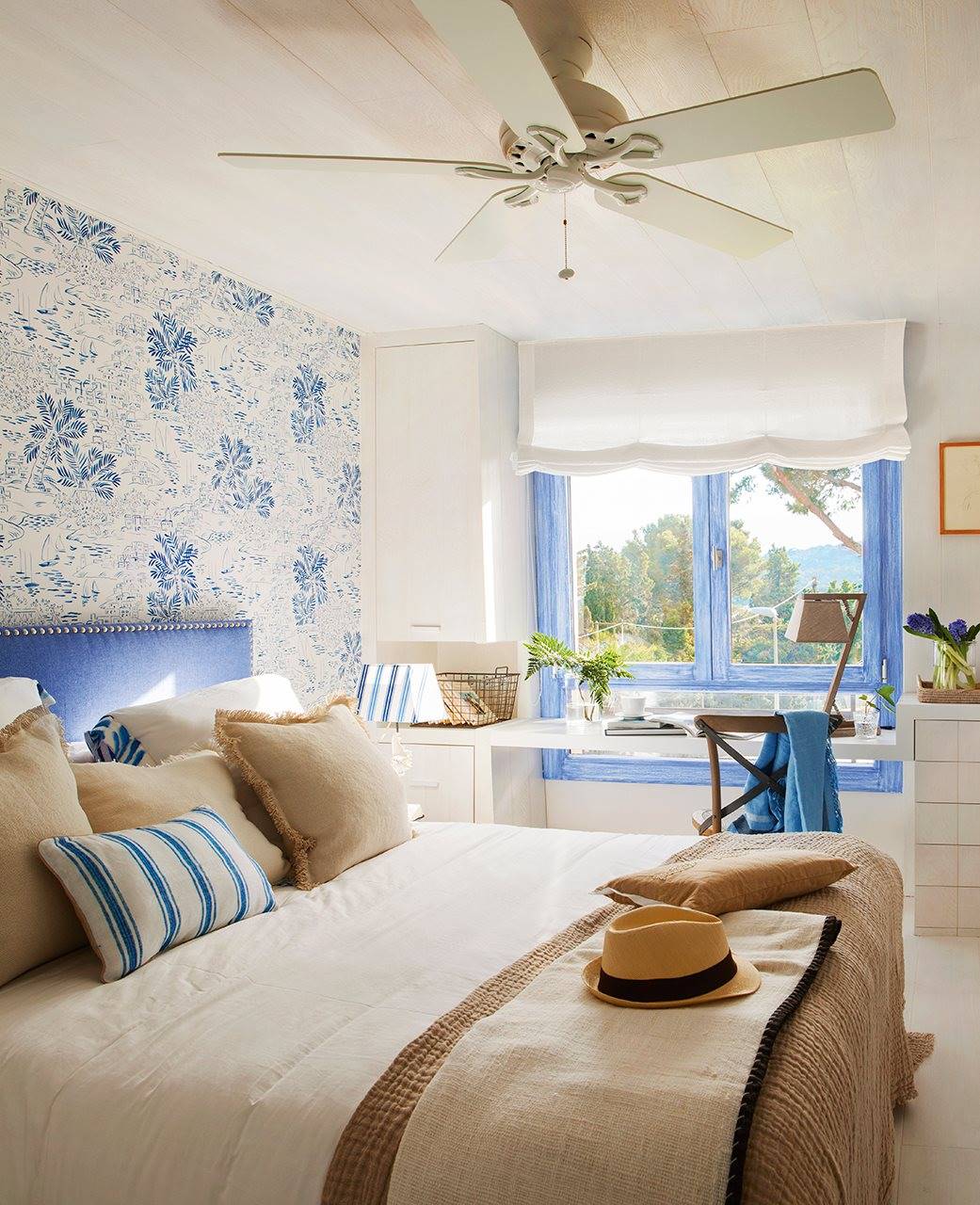 Summer bedroom with wallpaper