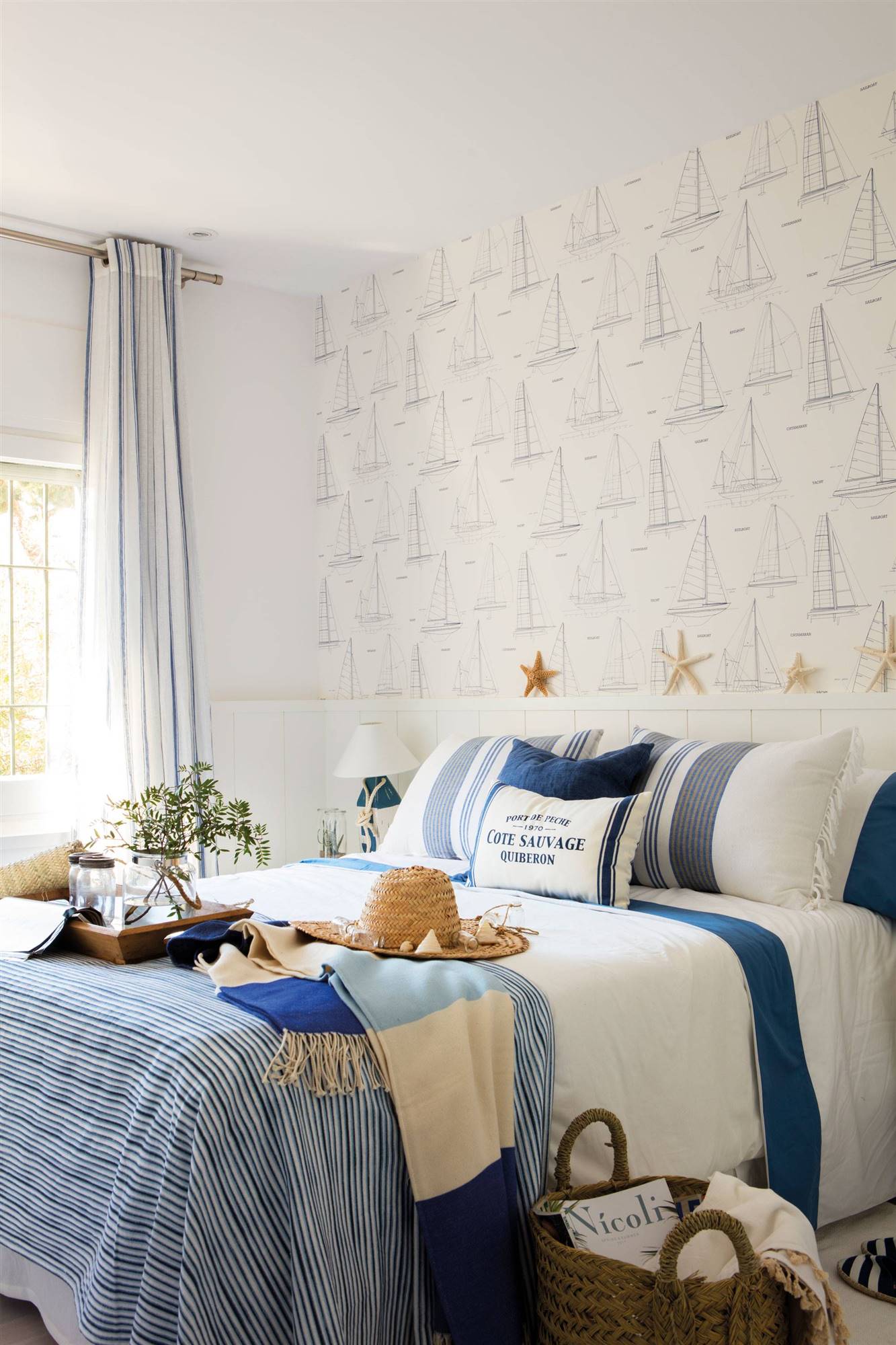 Summer bedroom with nautical wallpaper