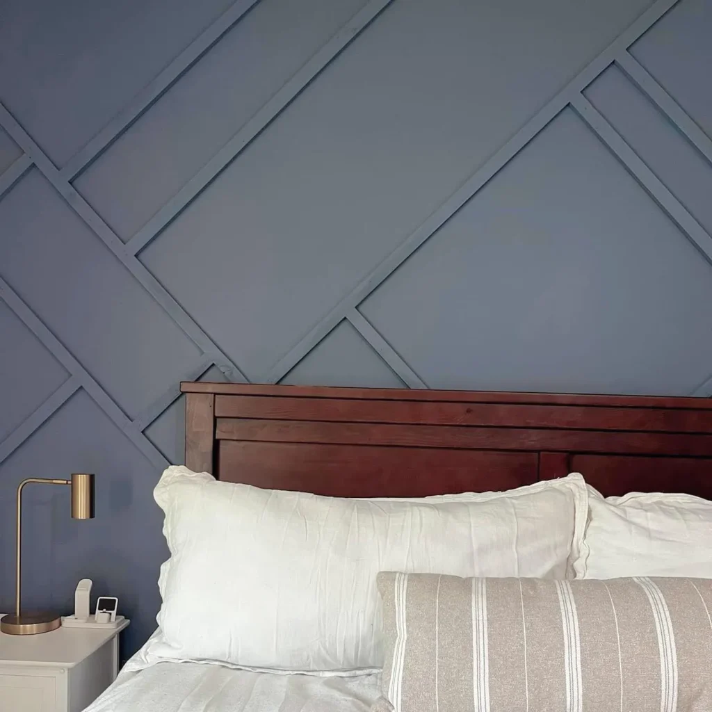 Bold Navy Accent Wall with Geometric Design